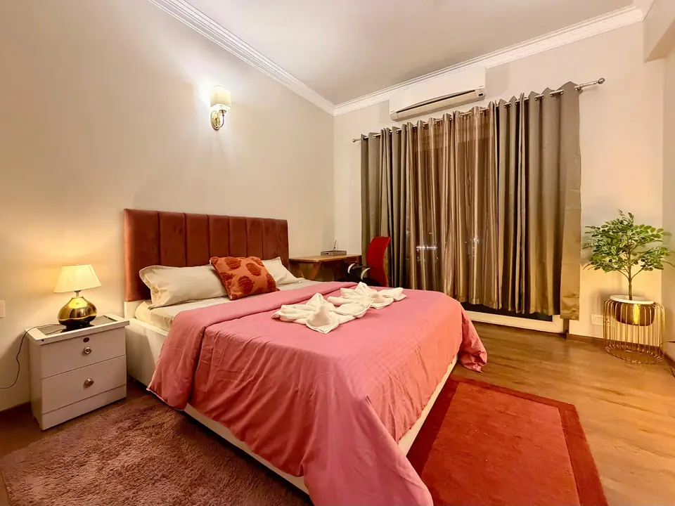 Bedroom with upholstered headboard