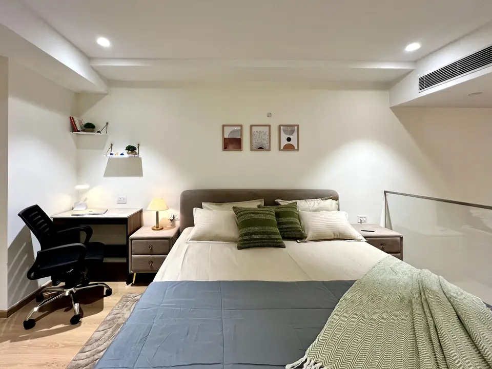 Bedroom with desk and chair