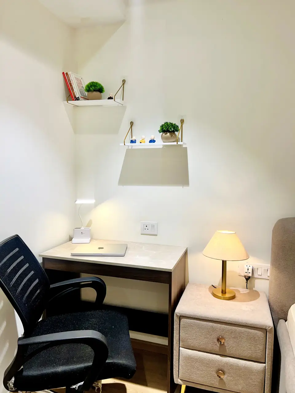 Dedicated workspace with desk and lamp